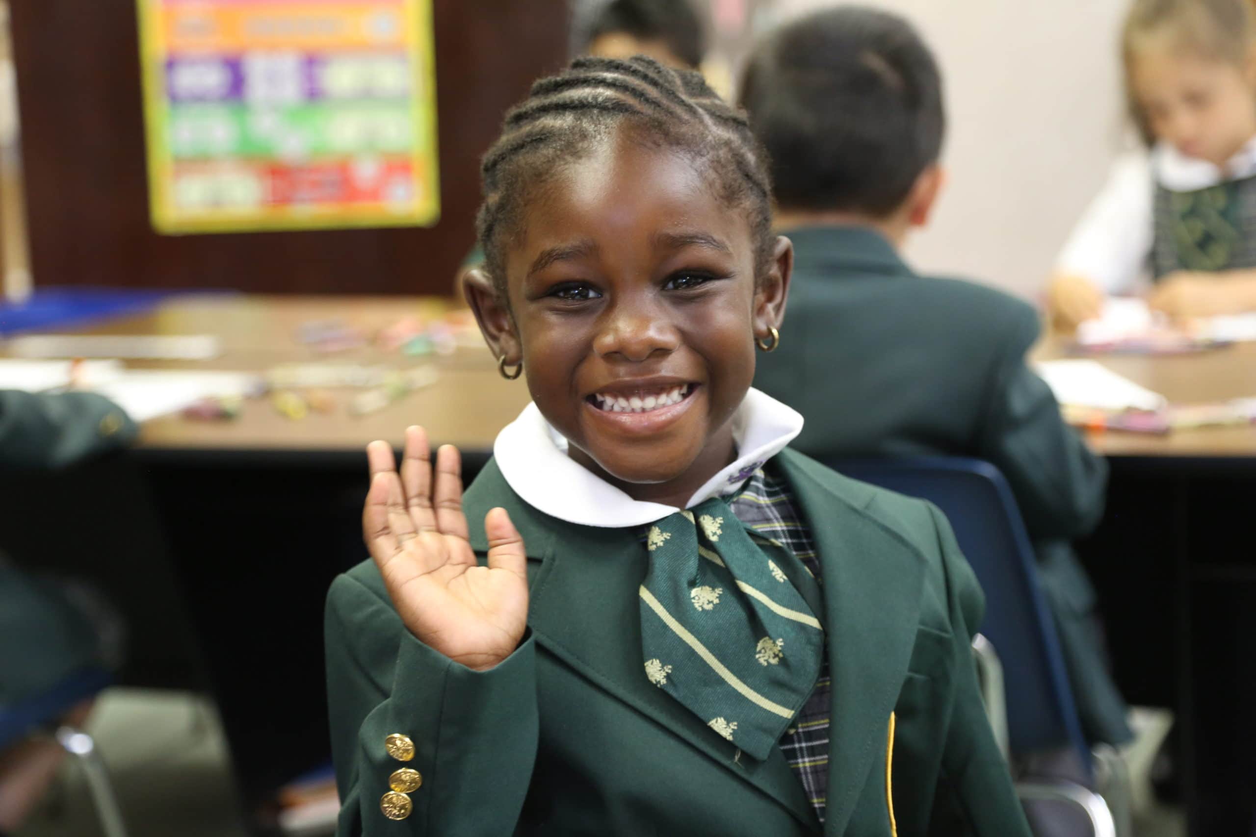 Best Private Schools Near Me | Top Private School in Annandale VA | Student Smiling a Waving at Camera